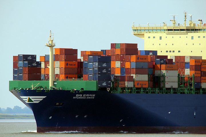 Cargo Ship Moving Home In Container